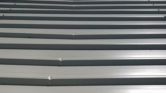 Photo showing rib damage due to point load.